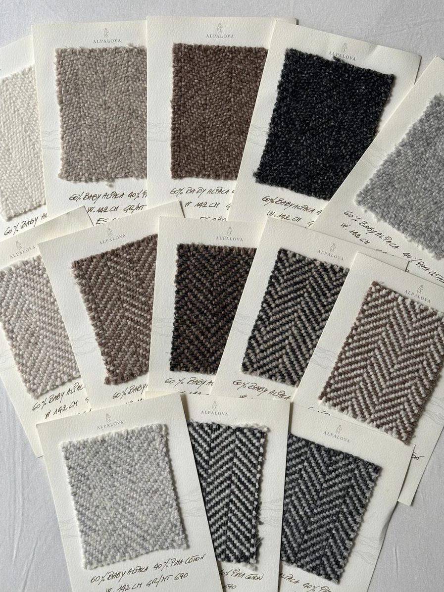 Swatch cards of ALPALOVA cloths, each with its composition, width and weight